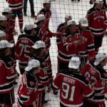 Park City Miners Hockey wearing their State Championships white hats after beating Olympus to take the title.