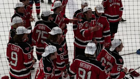 Park City Miners Hockey wearing their State Championships white hats after beating Olympus to take the title.