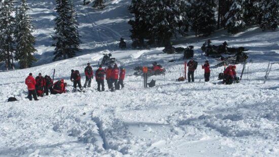 Emergency personnel on site at the fatal avalanche on Hoyt Peak.