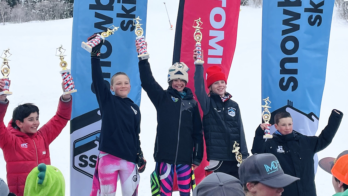 The boys' giant slalom podium at IMD Championships held a Snowbasin on March 15.. Banks Antablin, of Park City, won the race, while Forest Knight, also of Park City, took second place. Bronson Karr, of Park City, stands at far left - he placed fourth.