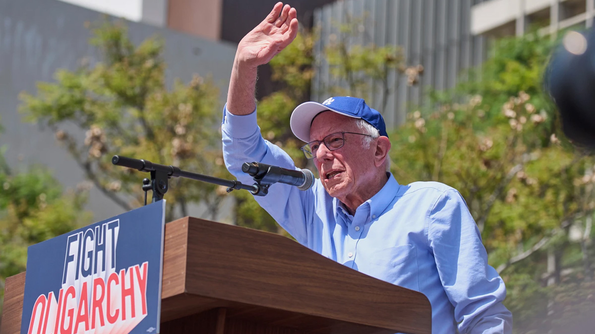 Bernie Sanders waves to the crowd at a "Fighting Oligarchy" rally in Los Angeles on April 12, 2025.
