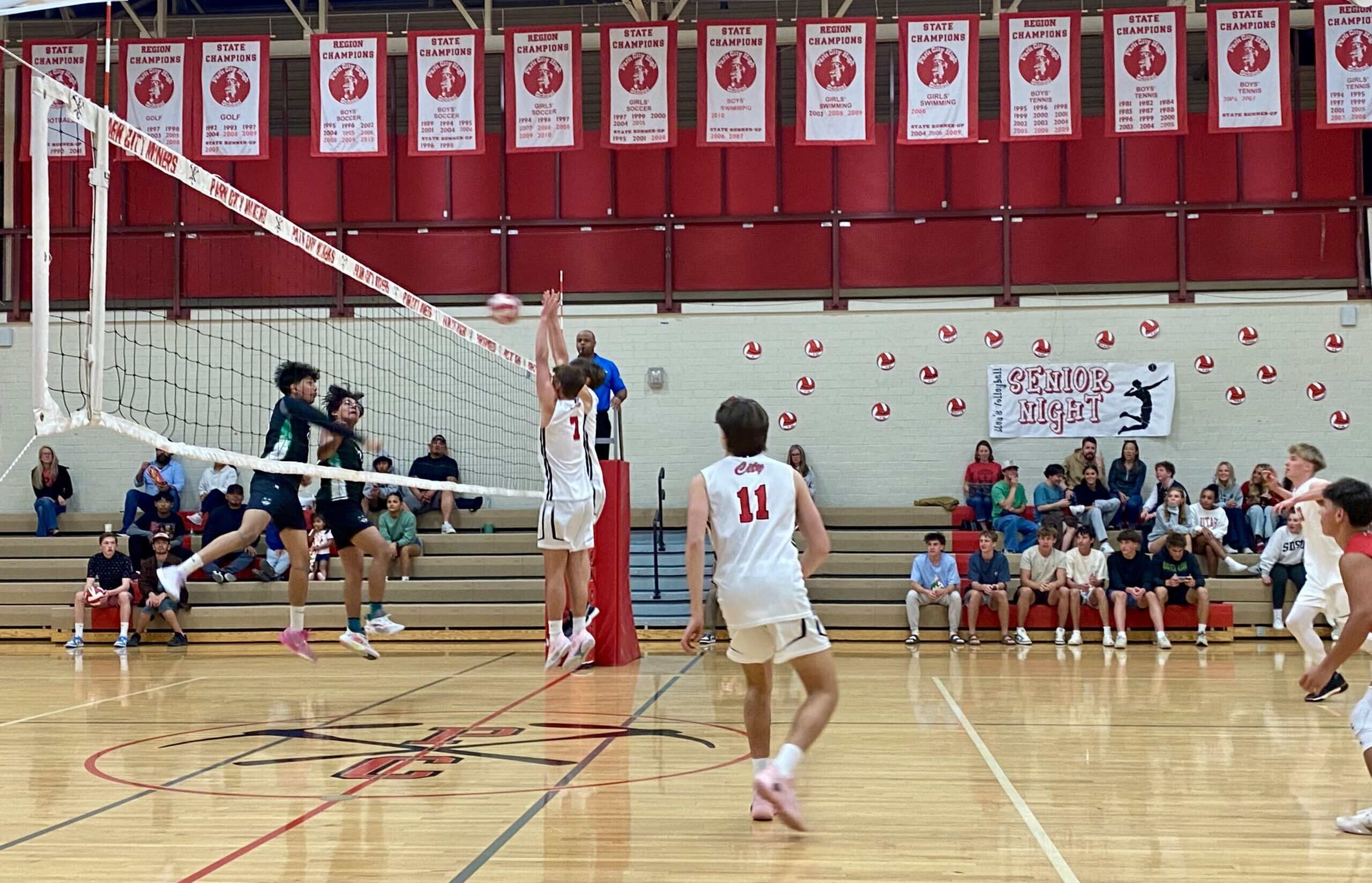 Julian Waters, #7 blocking the ball.