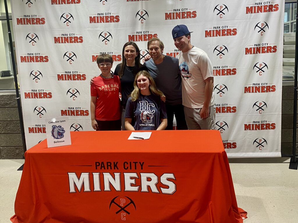 Cadence Lyon signs to play Volleyball in college at Bellevue.