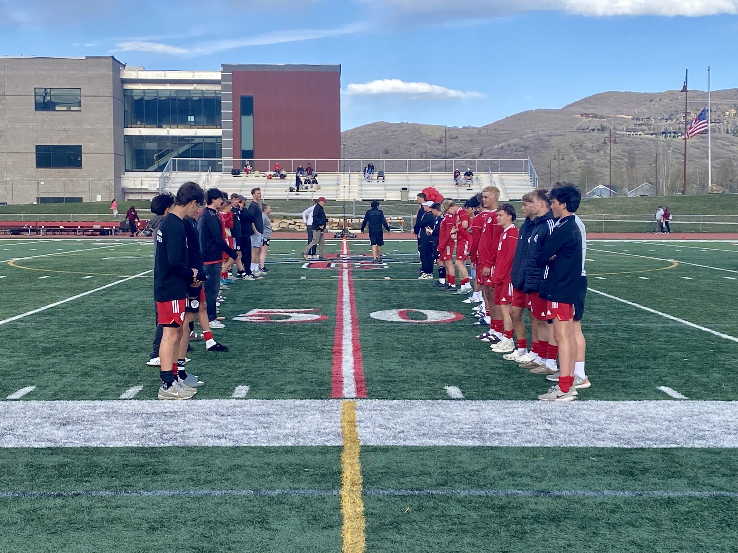 Lines formed by non-seniors for the senior players and their families to walk.