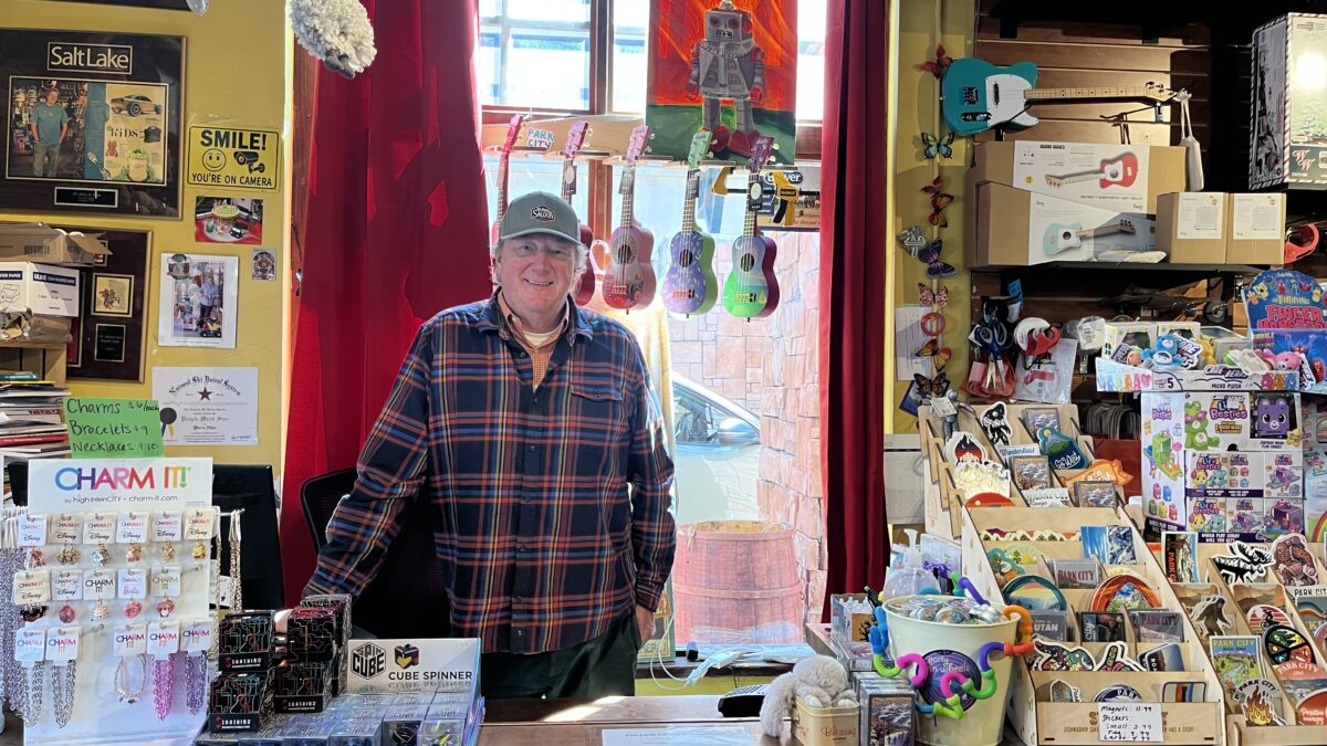 Jon Allen, founder and owner of J.W. Allen & Sons, stands behind the counter of his Park City toy store, which has served the community with classic toys, games, and candy since 2005.