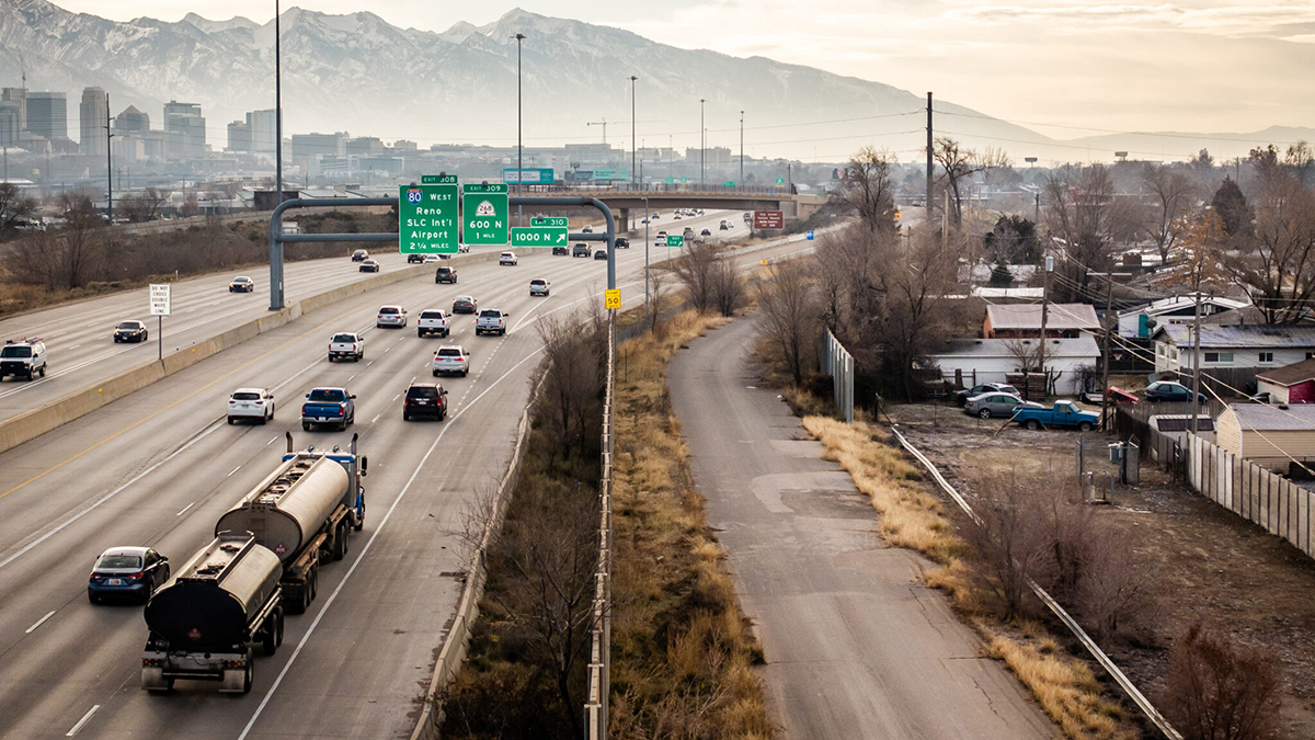 Traffic moves along I-15 near neighborhoods in the Rose Park neighborhood of Salt Lake City on Wednesday, January 3, 2024.