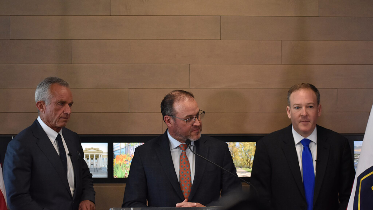 U.S. Health and Human Services Secretary Robert Kennedy Jr. (left) and Environmental Protection Agency Administrator Lee Zeldin (right) listen as Utah House Speaker Mike Schultz, R-Hooper, (center) speaks during an event at the University of Utah on Monday, April 7, 2025.