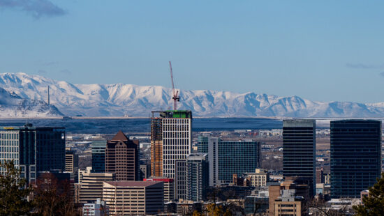 The downtown Salt Lake City skyline is backdropped by fresh snow on the Wasatch Mountains on Monday, January 15, 2024.