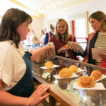 The Ballerina Farm storefront includes an attached bakery serving croissants, foccacia bread, and more.