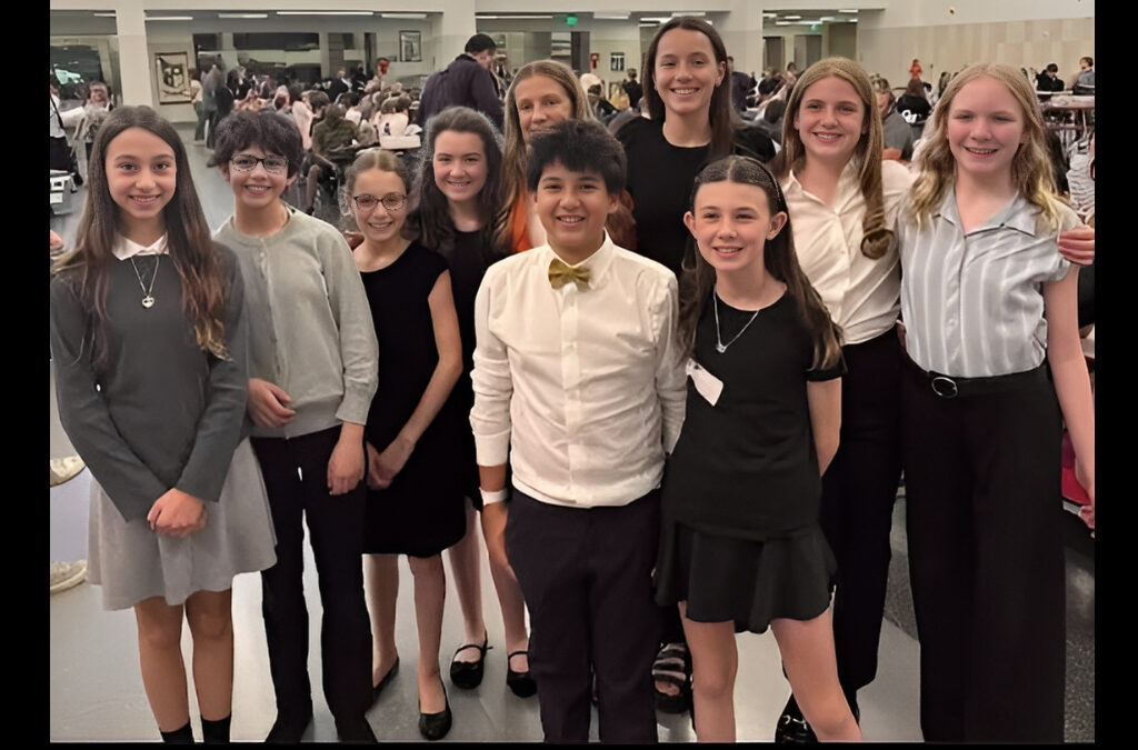 Members of Park City School District’s elementary debate team pose at the Utah state championship, where five of the district’s 12 teams scored top-10 finishes.