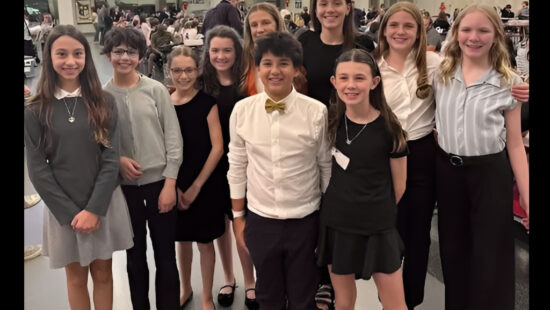 Members of Park City School District’s elementary debate team pose at the Utah state championship, where five of the district’s 12 teams scored top-10 finishes.