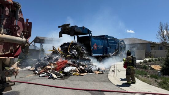 A garbage truck dumped its load after the driver recognized it was on fire.