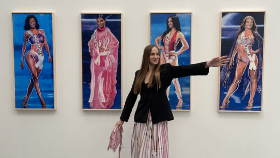 Gretchen Andrew's with her work, “Facetune Portraits,” each canvas revealing bold brushstrokes that lay bare beauty-filter edits.