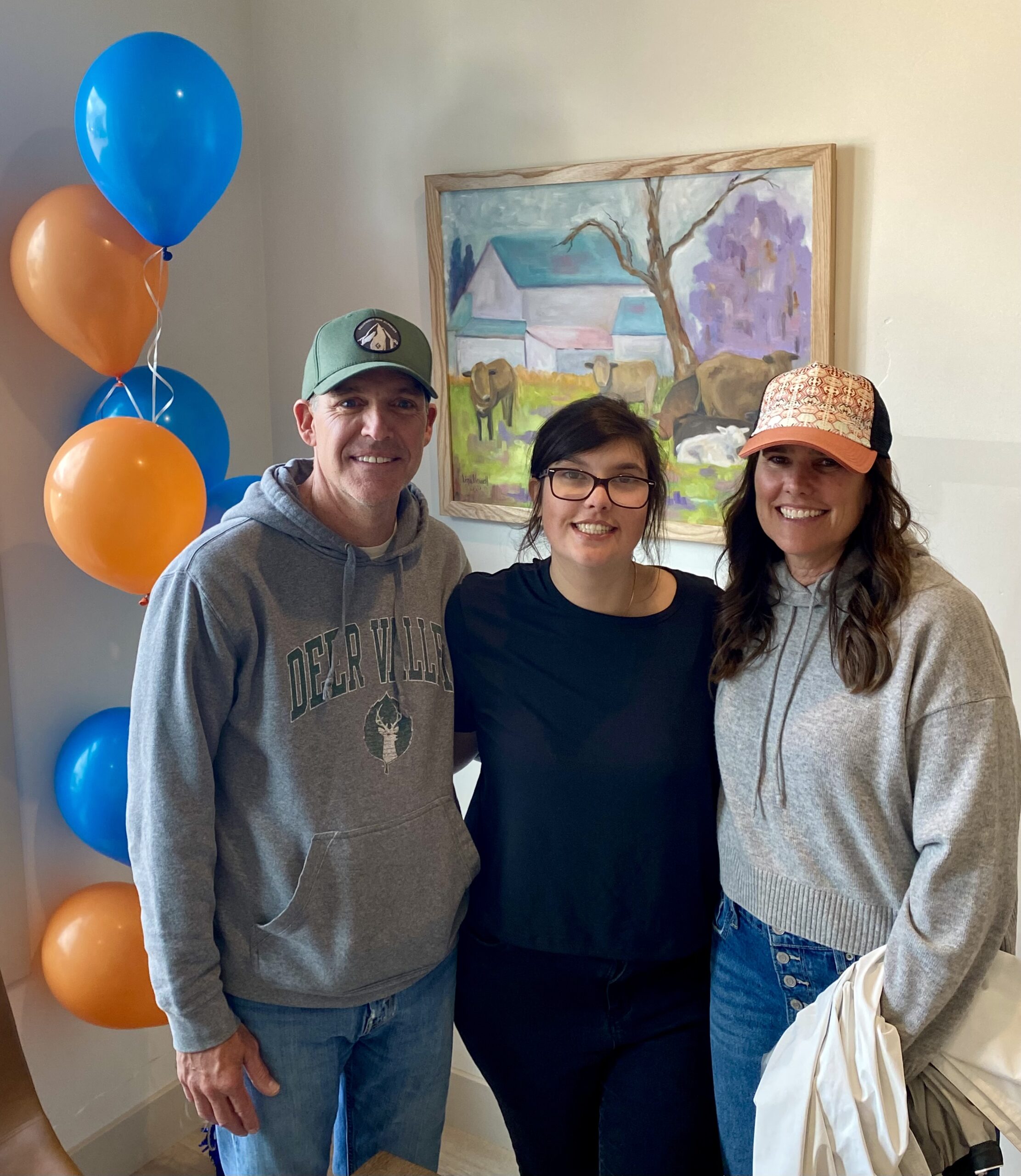 Ava Jennings (Center) with her parents.