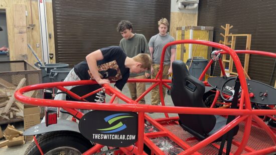 Students in Park City High School’s engineering lab fine-tune their Switch Lab electric car kit. Photo: Rebecca Brenner