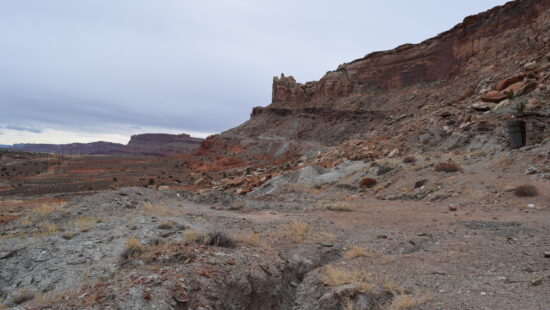 Uranium mine waste (gray-green rock) at the now-closed Shinarump Mine site, 10 miles northwest of Moab.