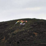 The PC on PC Hill wrapped in Pride colors on Wednesday, May 7, 2025.
