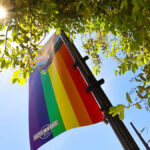 A Park City Pride banner flies on Main Street during Pride Month.