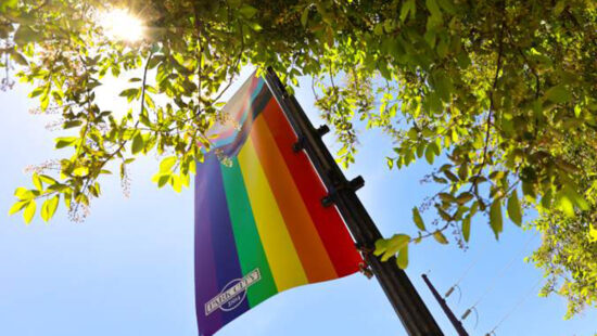 A Park City Pride banner flies on Main Street during Pride Month.