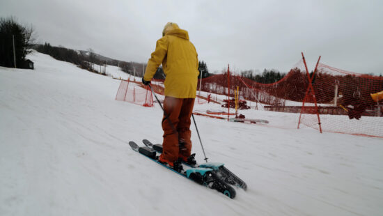 A pair of Vipera electric skis boots a skier up a slope in Massachusetts.