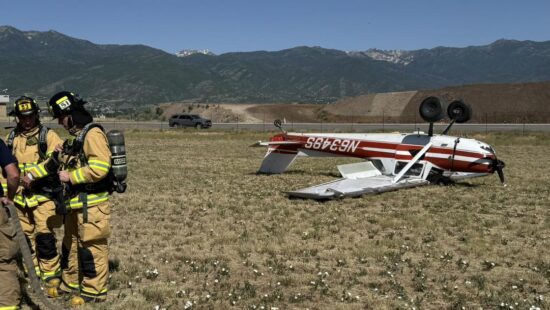 An overturned aircraft rests on the grass at Heber City Airport after a failed landing attempt on June 17, 2025. The pilot, practicing grass landings, escaped with only minor injuries.