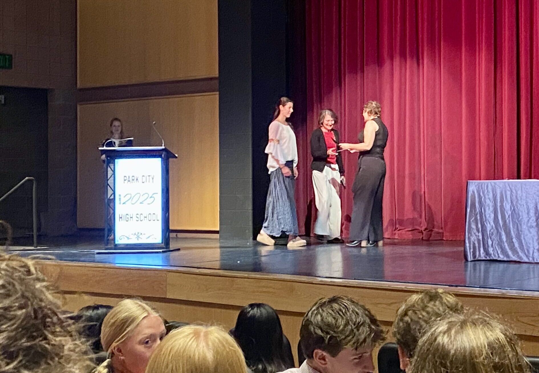 Debby Seaver (center) handing out the scholarship named after her late son, Grant.