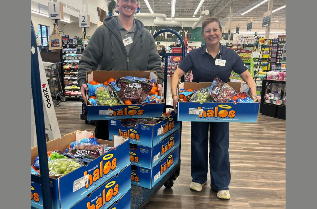 Macey’s employees prepare boxes of fresh fruit for weekly delivery to Park City schools as part of the SCG-EATS Fruit to Schools program.