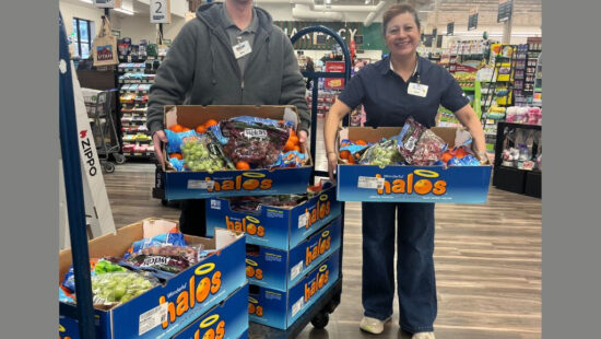 Macey’s employees prepare boxes of fresh fruit for weekly delivery to Park City schools as part of the SCG-EATS Fruit to Schools program.