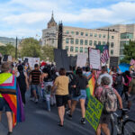 Protesterst march toward the state capitol in the "No Kings" rally on Saturday, June 14, 2025.