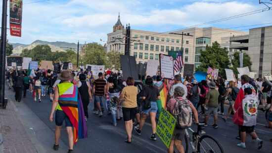 Protesterst march toward the state capitol in the "No Kings" rally on Saturday, June 14, 2025.