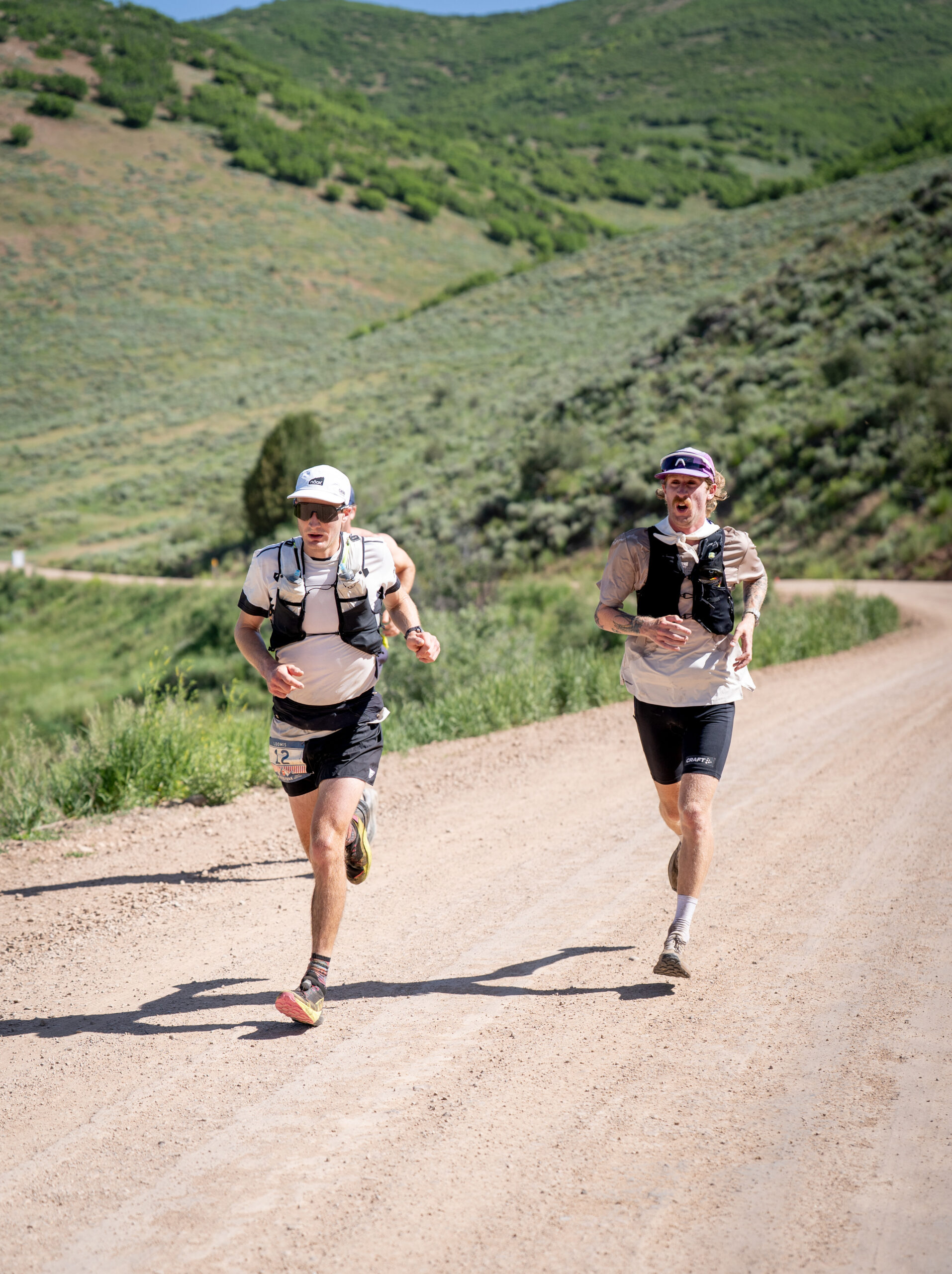 Winner Adam Loomis (L) with training partner and 2nd place finisher Grant on the Jeremy Ranch Road. Photo: Zeb Watson