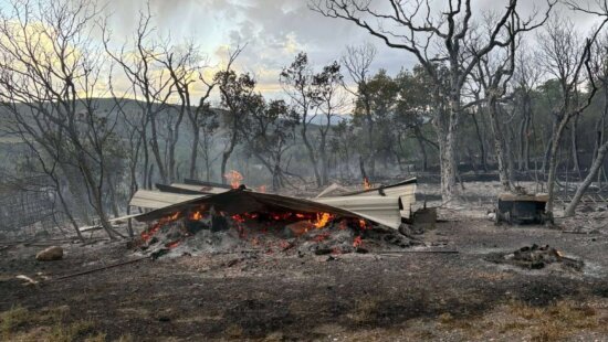 The 3.8-acre wildfire near Highway 35 in Woodland, Utah, destroyed one outbuilding.