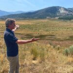 Aldy Milliken shows the new Kimball Art Center land site.