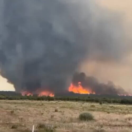 A rare fire vortex, or “firenado,” spins above the Deer Creek Fire near La Sal, Utah, on July 12, 2025.