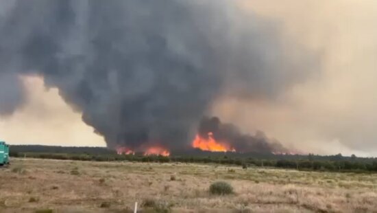 A rare fire vortex, or “firenado,” spins above the Deer Creek Fire near La Sal, Utah, on July 12, 2025.