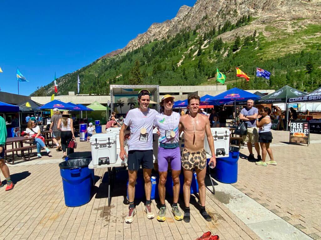 Men's podium: Mason Coppi from CO (center) in 1st, Hawk Call (right) from Provo, UT in 2nd, and Sam Hendry from Salt Lake City in 3rd.