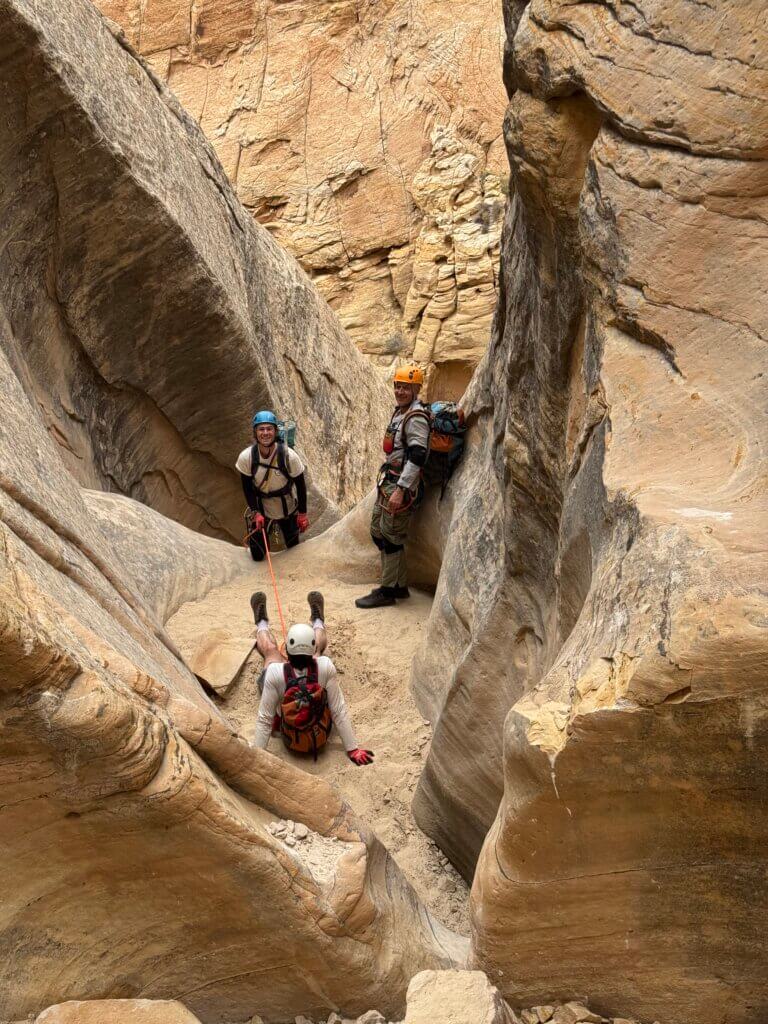 Tom Jones (right) Tory Hoffman (center standing,) and Root Roepke dug into the ground acting as a human anchor.