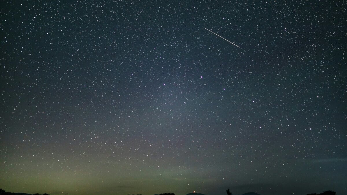 Meteors in the night sky.