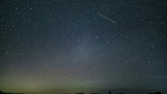 Meteors in the night sky.