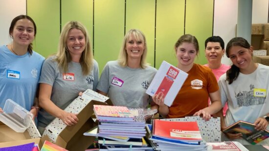 Volunteers at a previous year's Back to School Basics event.