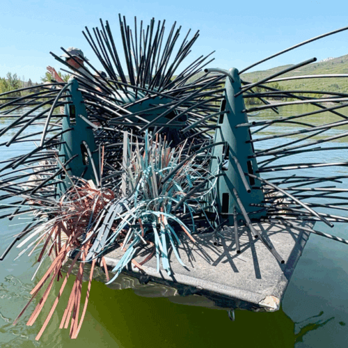 A fish habitat structure being installed in Pineview Reservoir.