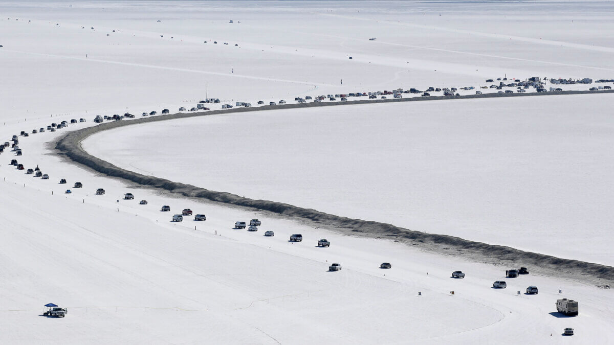 Cars form a line near the race track at the Bonneville Salt Flats near Wendover, Utah, Aug. 13, 2016.