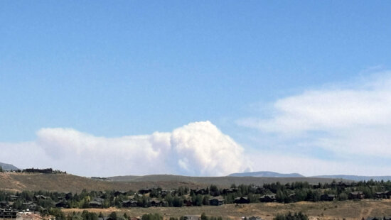Smoke from the Beulah Fire billows from the Uinta Mountains shortly after 1p.m. on Thursday, August 7, 2025.