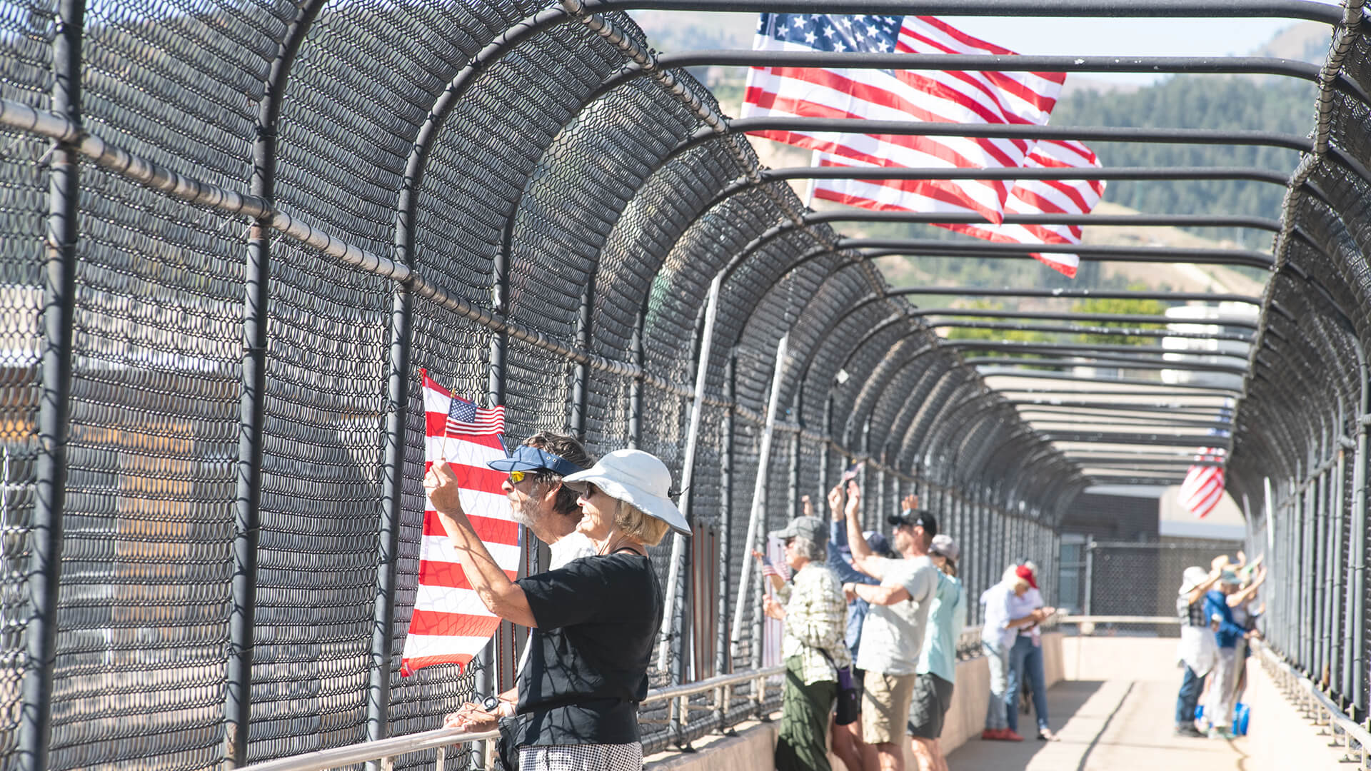 Protesters on the I-80 overpass on August 16, 2025. 