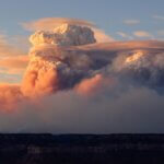 In this photo, 'fire clouds' form near the Bright Angel Trailhead at the South Rim in the Grand Canyon, Ariz., Sunday, July 27, 2025.