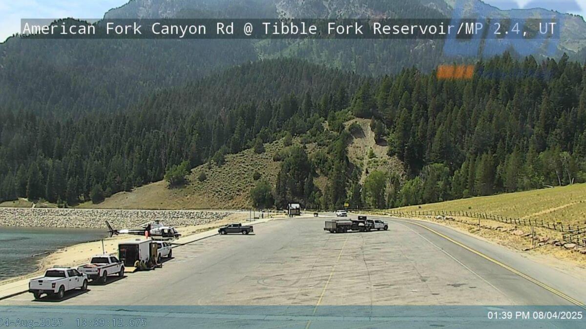 Fire fighting operations at Tibble Fork Reservoir parking lot.