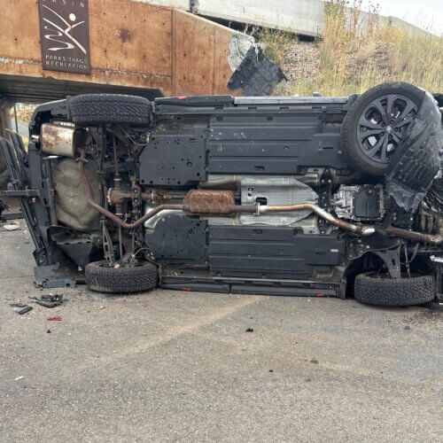 A vehicle left the roadway and rolled onto the bike path Friday afternoon. 
