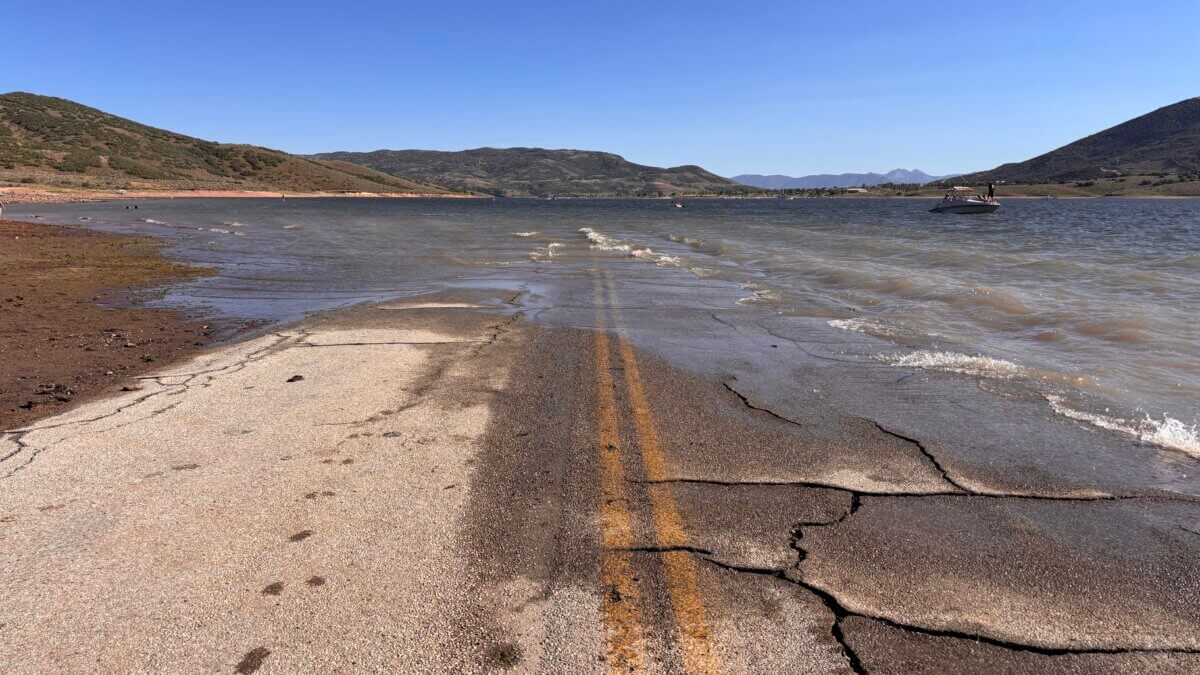 Where pavement meets water—this was once the main road to Keetley, now submerged beneath Jordanelle Reservoir.