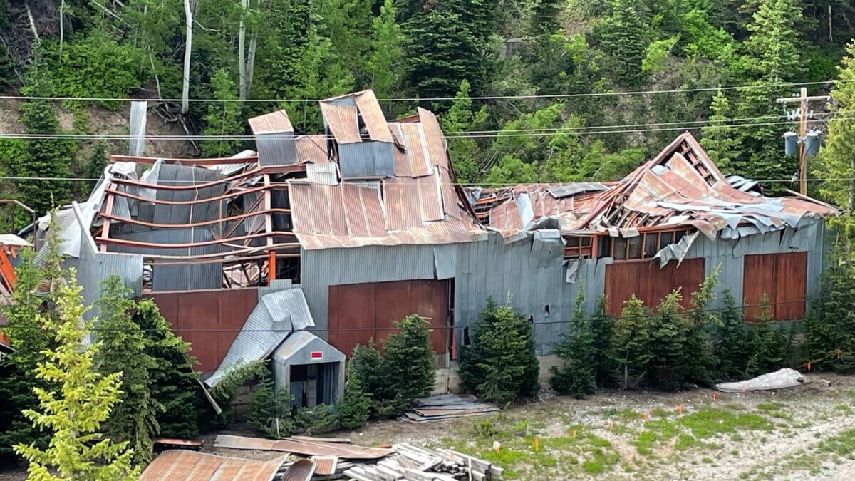 Damage to the exterior shaft room and hoist house at the Thaynes Mine site.