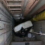 Crews work to plug the collapsing Thaynes mine shaft.